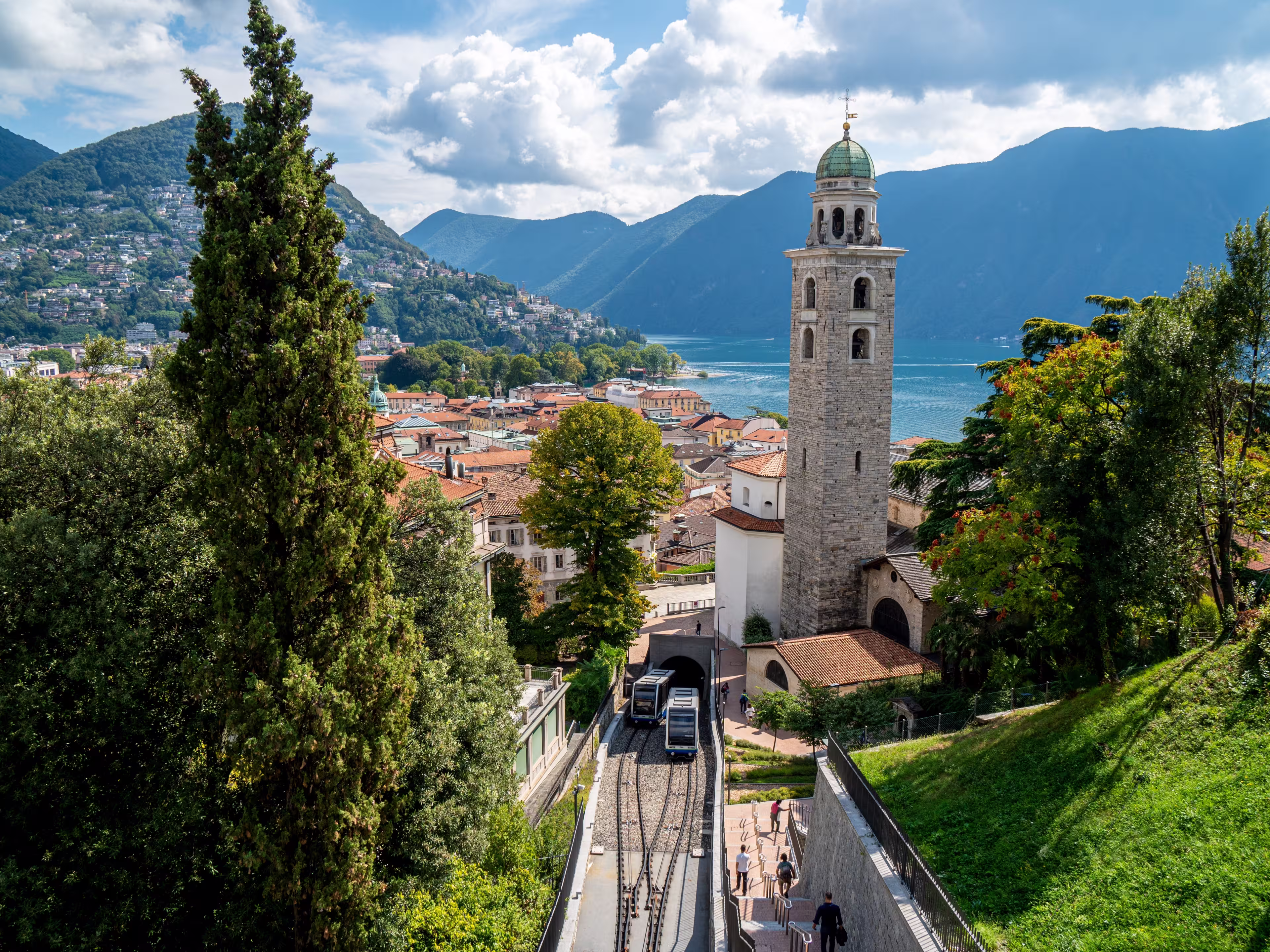 Lugano City - Ticino - during late Summer with the funicular and the San Lorenzo Church and the Lago di Lugano in the background
