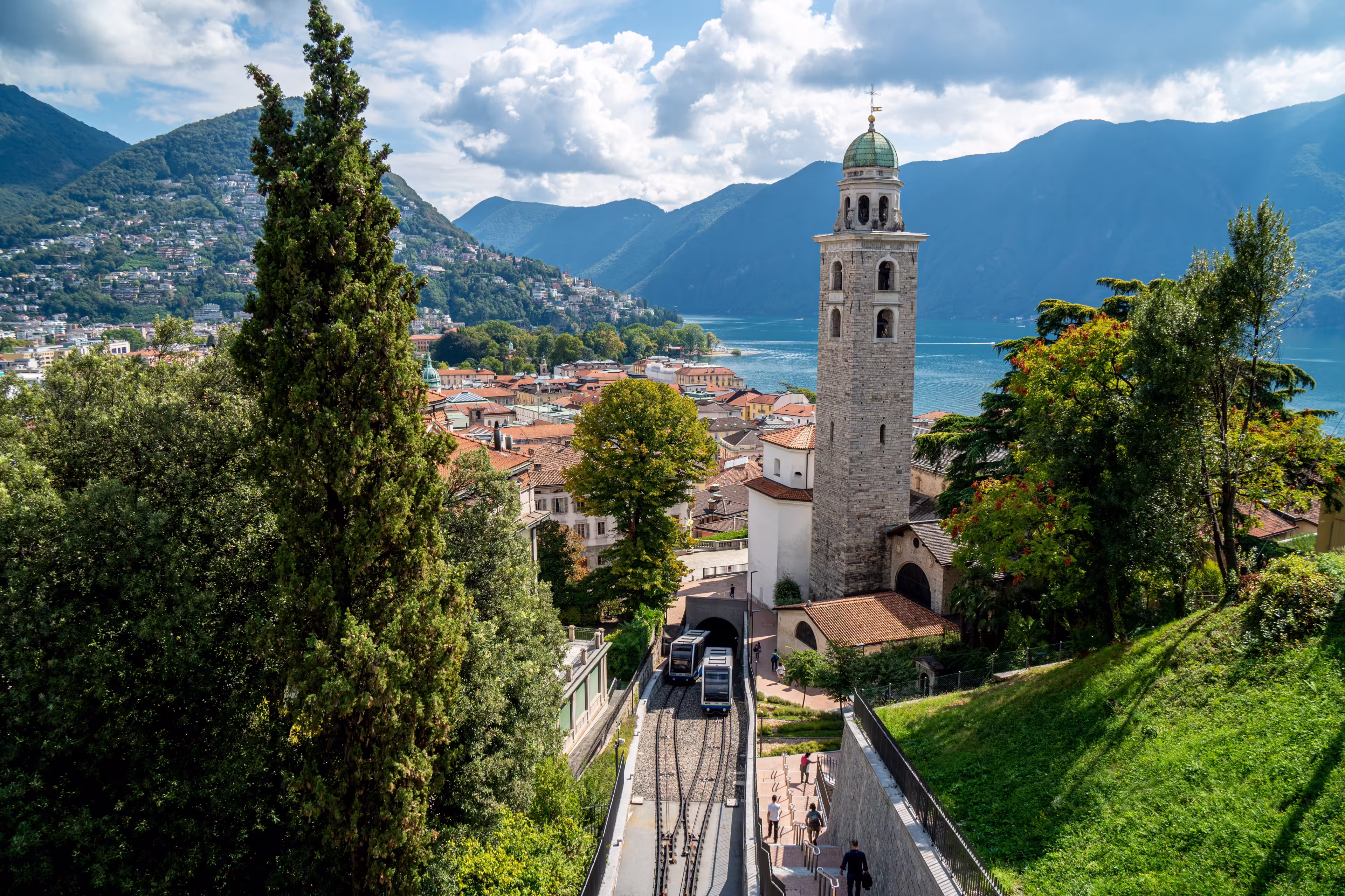 Lugano City - Ticino - during late Summer with the funicular and the San Lorenzo Church and the Lago di Lugano in the background