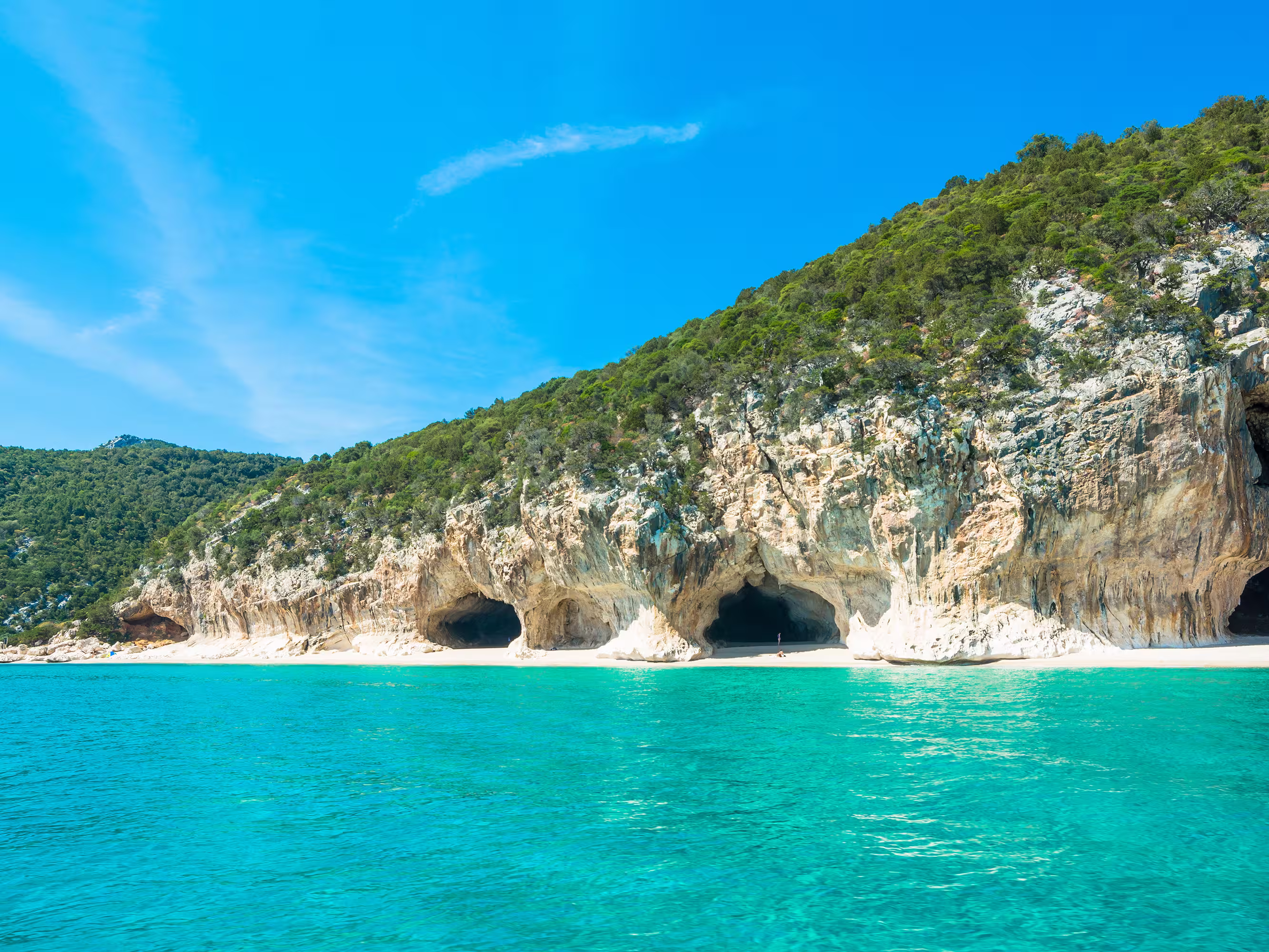 Cala Gonone shoreline on a clear day, Sardinia