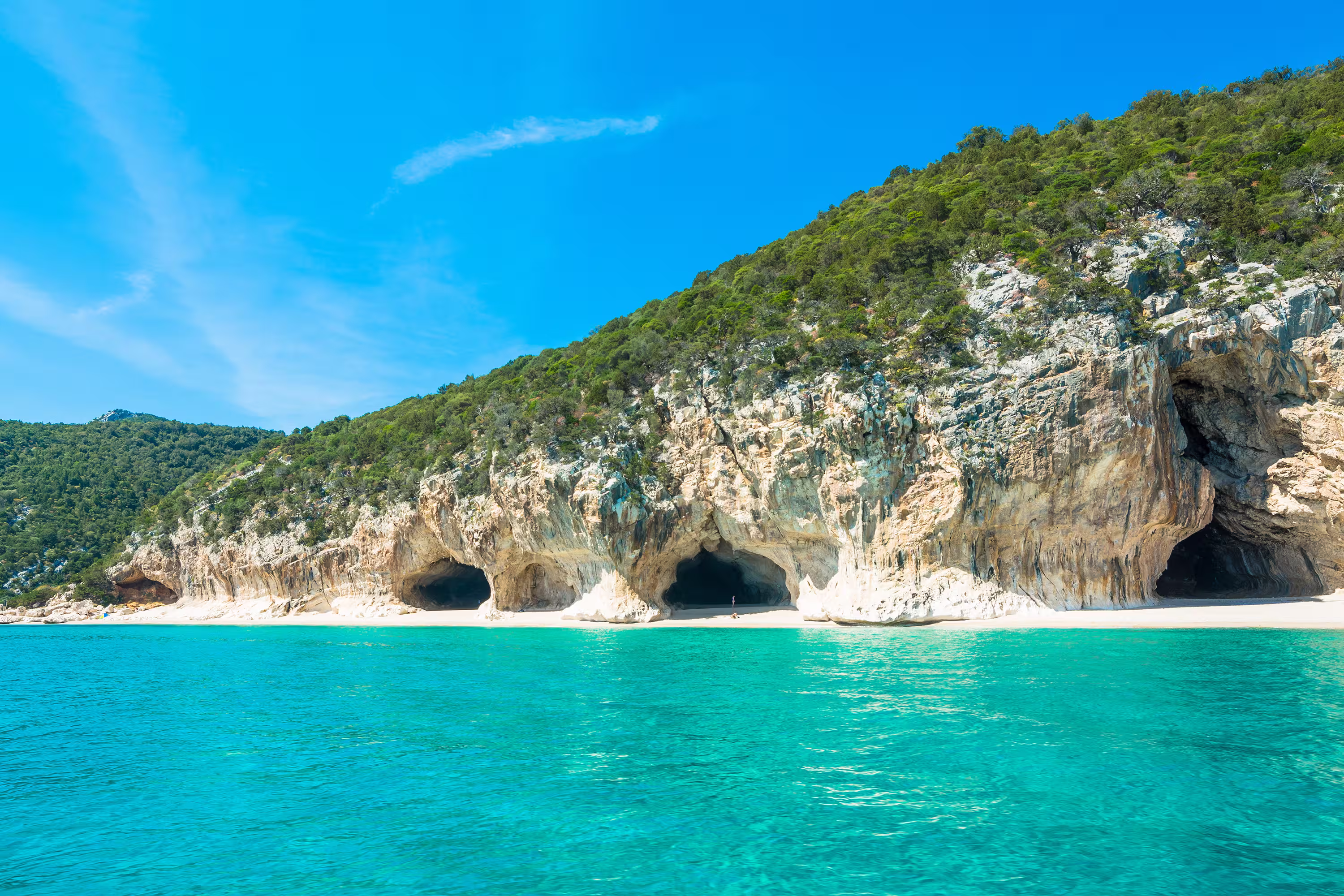 Cala Gonone shoreline on a clear day, Sardinia