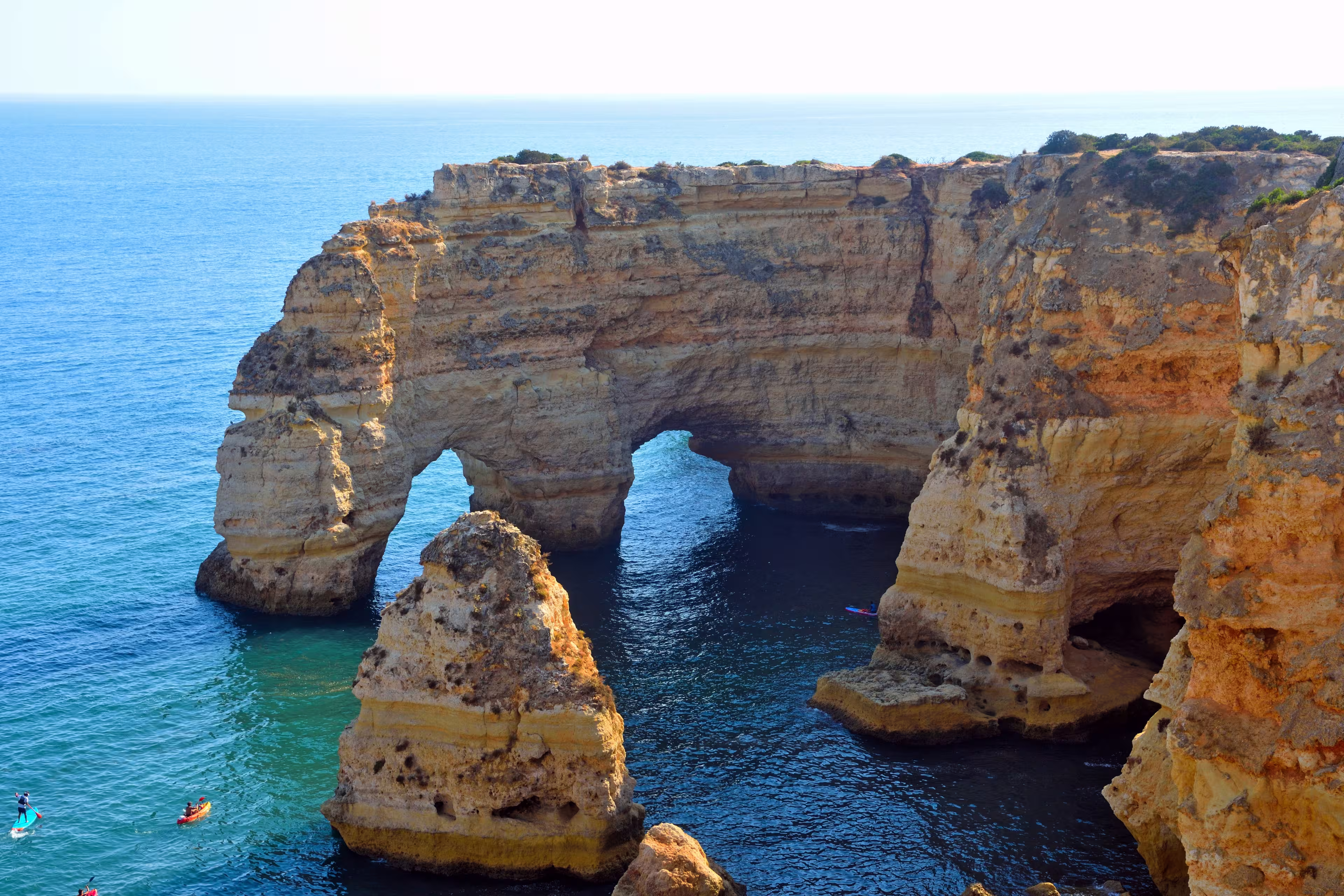 walking path with breathtaking views through the coast from porches to benagil caves lagoa algarve portugal