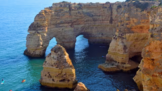 walking path with breathtaking views through the coast from porches to benagil caves lagoa algarve portugal