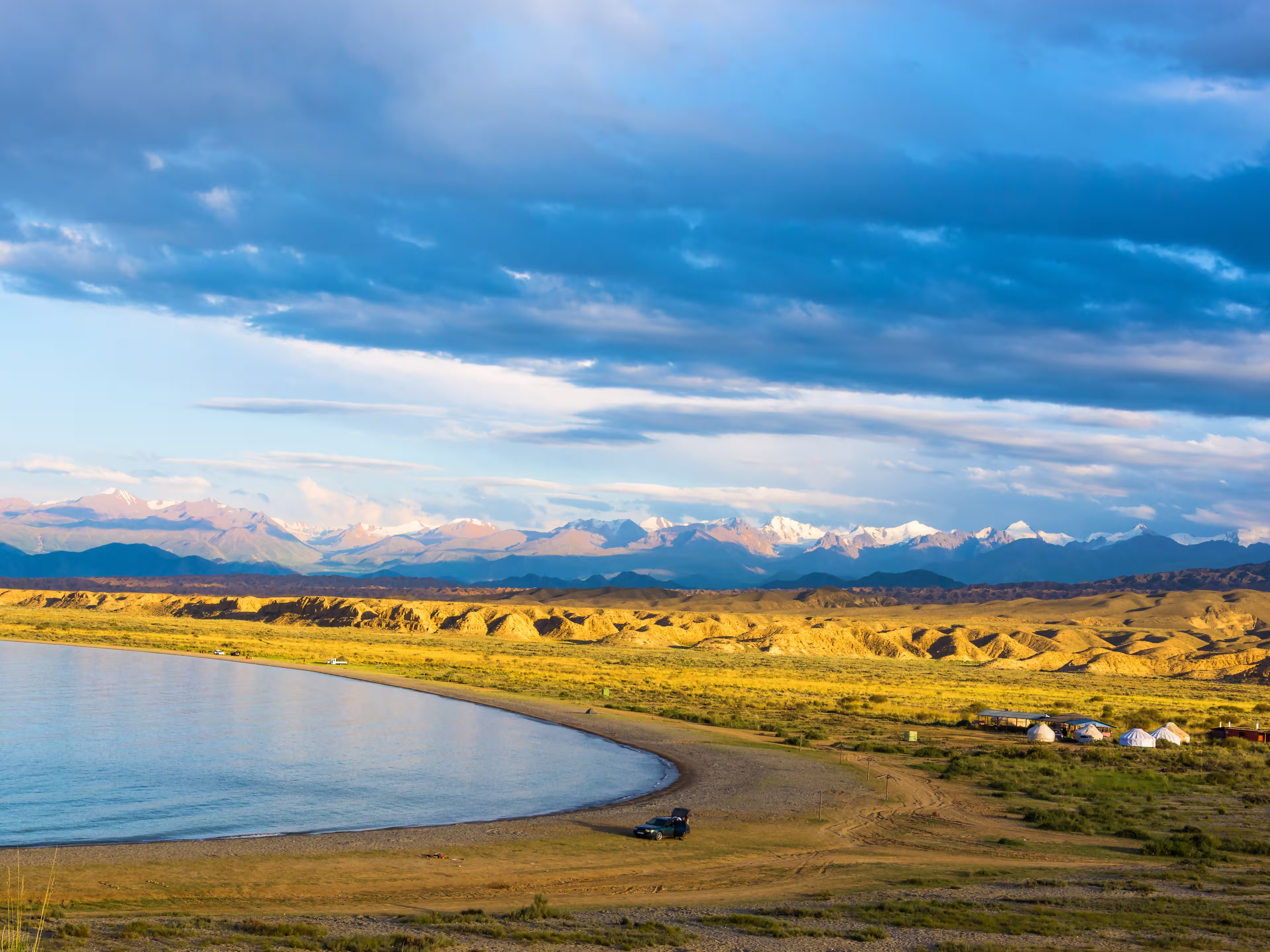 Beautiful southern shore of Lake Issyk-Kul in the summer day, Kyrgyzstan.