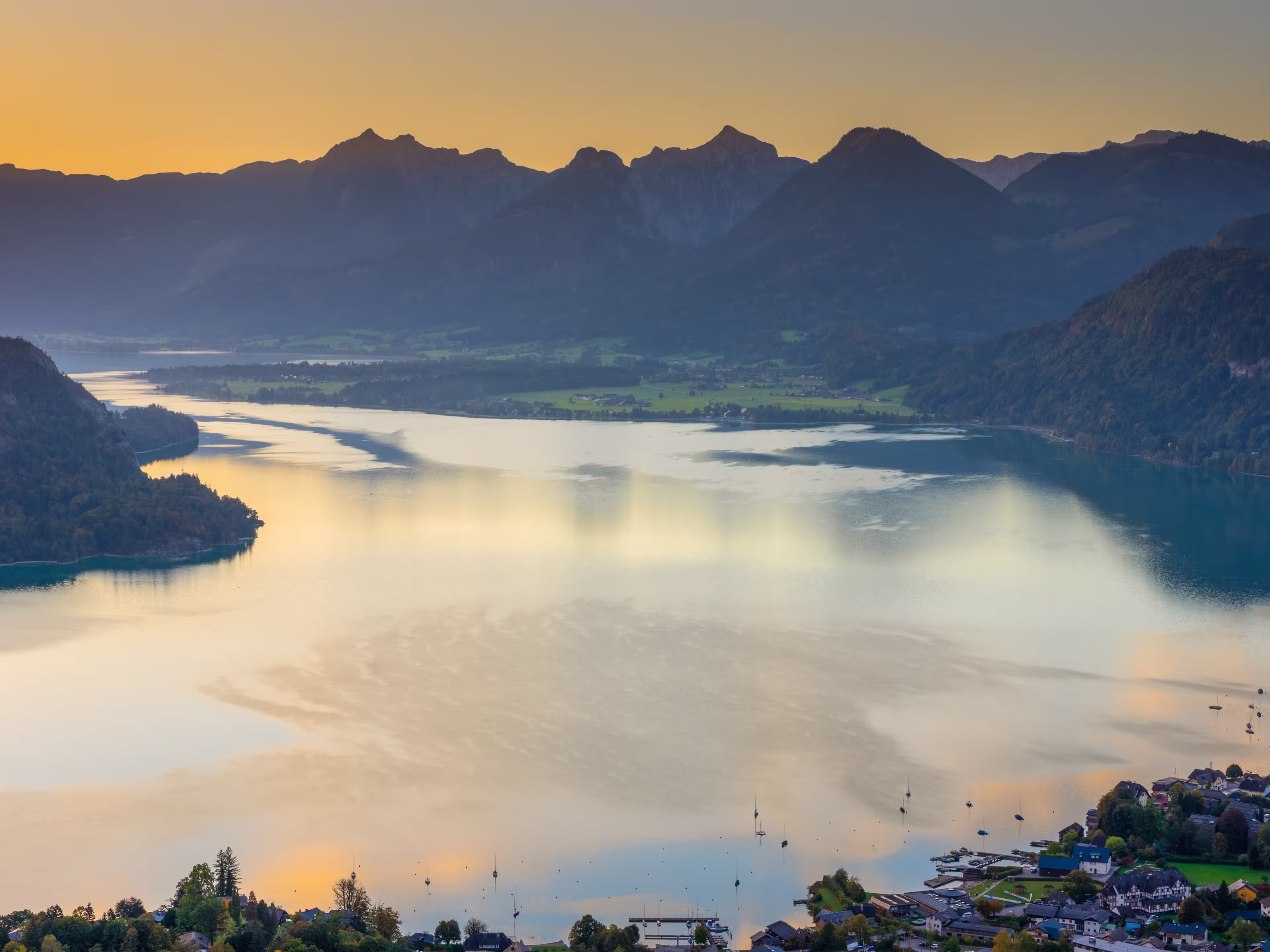 Sunrise over Wolfgangsee and view towards Bad Ischl