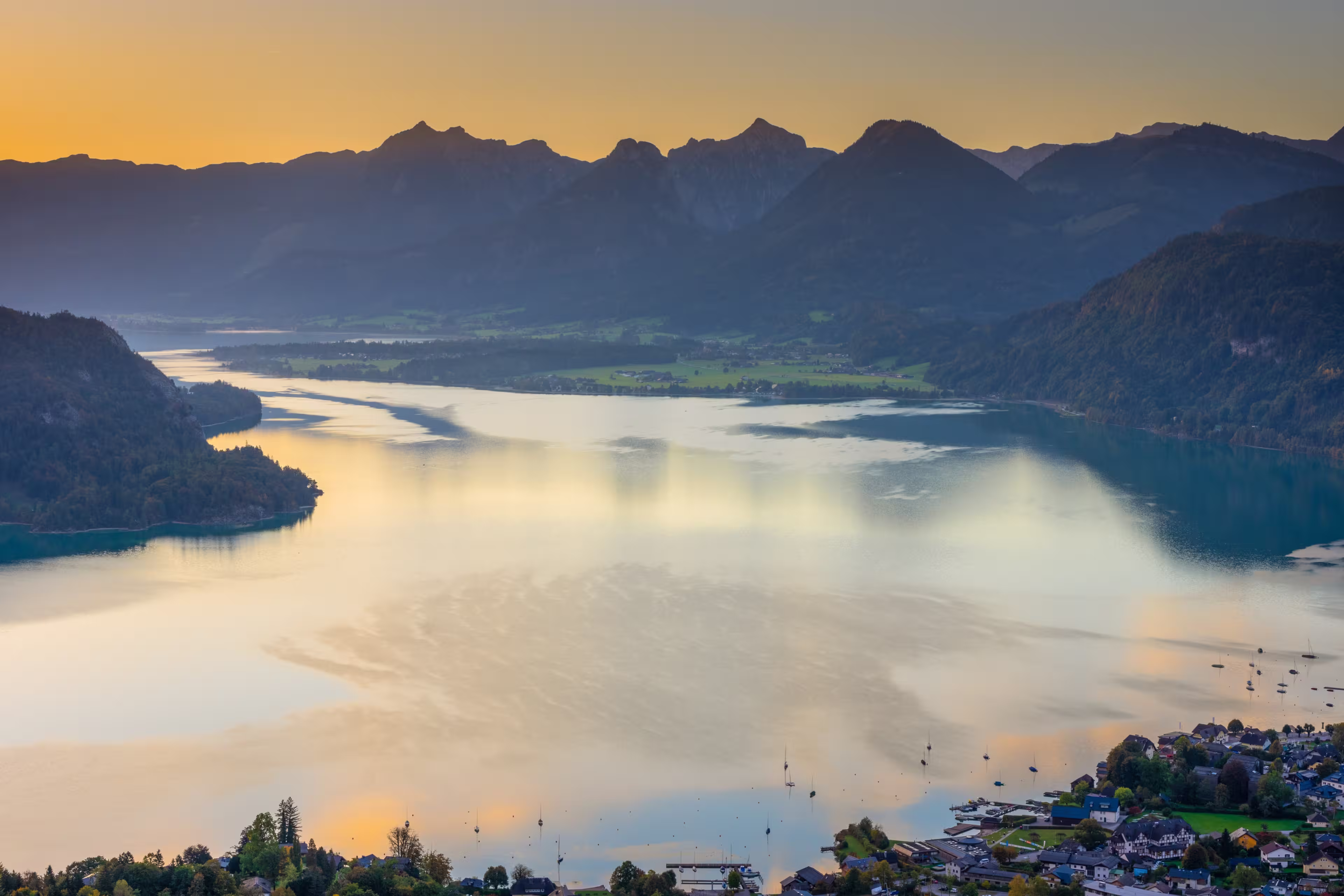 Sunrise over Wolfgangsee and view towards Bad Ischl