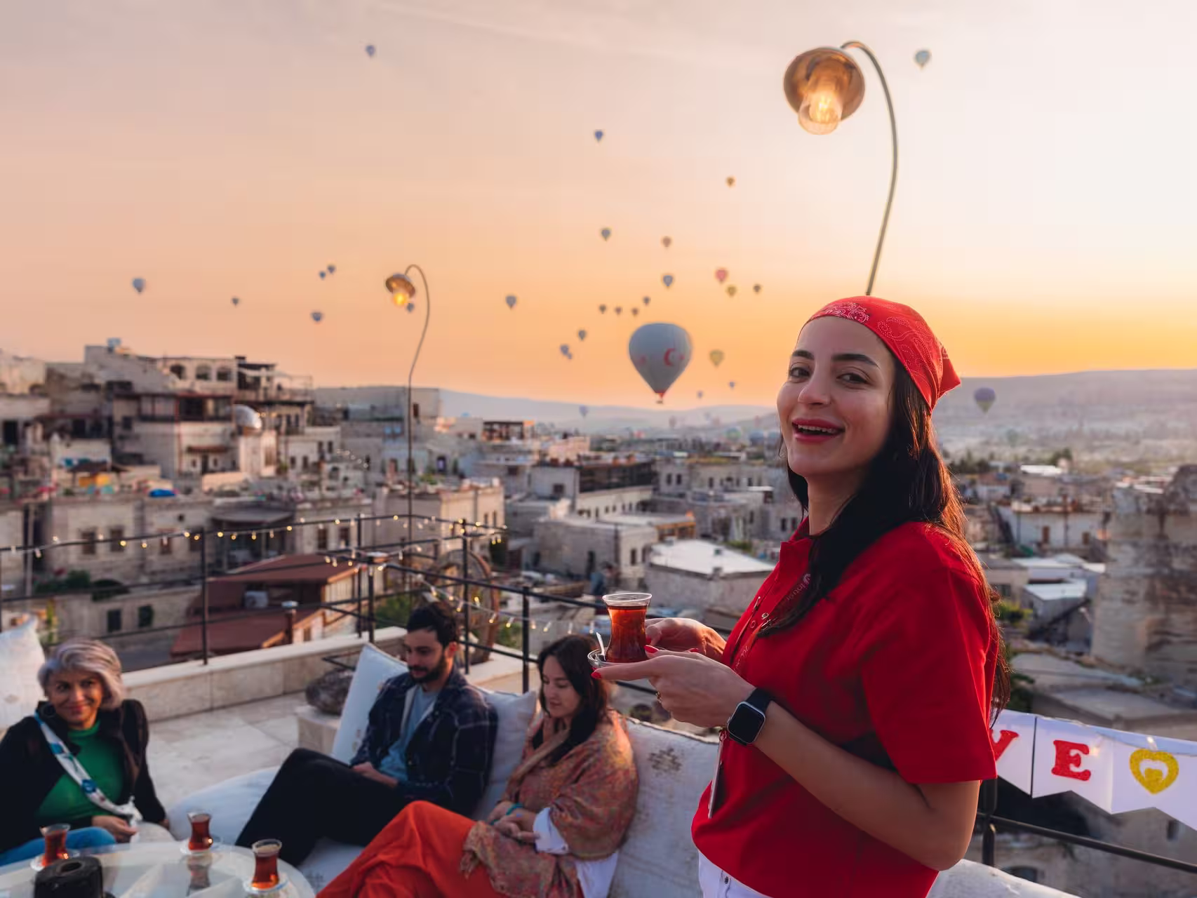 Take in the majesty of hot air balloons ascending into the sky with Cappadocia's sunrise