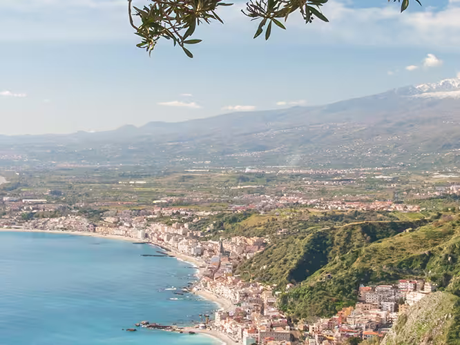 Mount Etna seen from a viewpoint of the roman theater in Taormina, Sicily