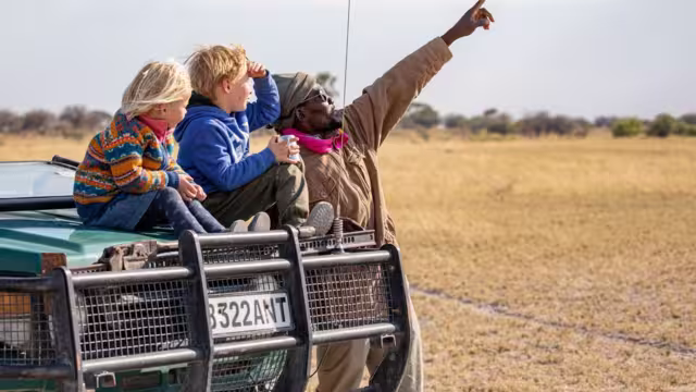 Family fun with leader, Botswana