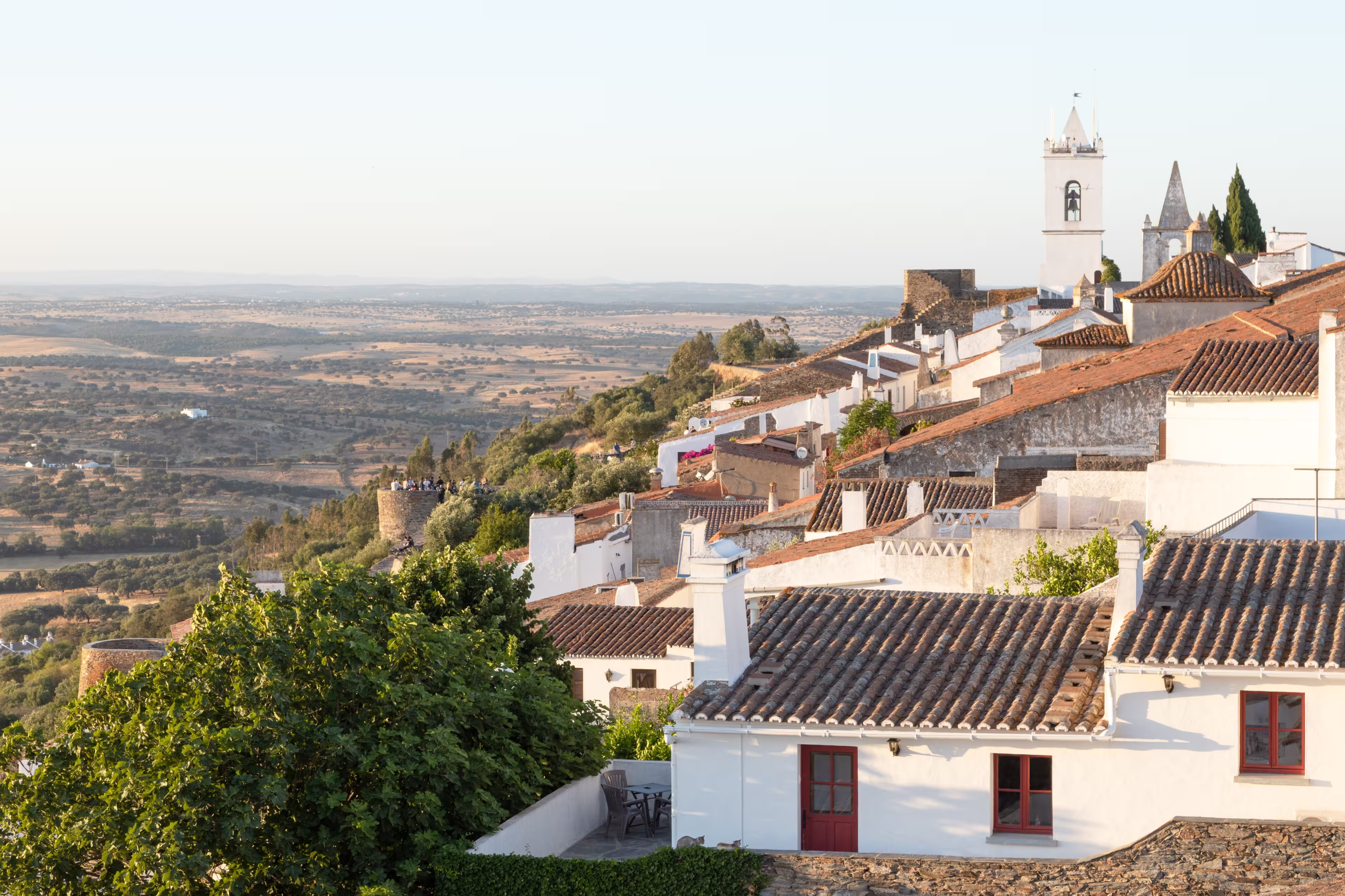 graceful medieval village of Monsaraz view from the highest part of the castle. Historic village made of lime and schist, located on the top of the hill. Alentejo destination. picturesque white facade