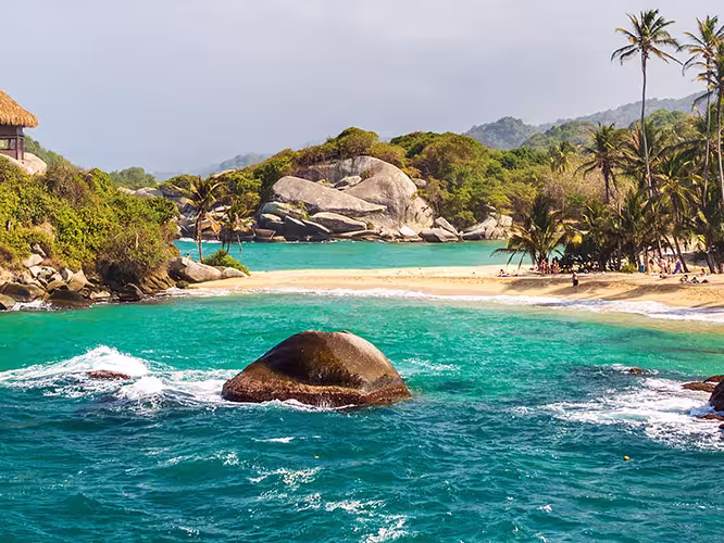 colombia tayrona national park beach sea palms hut
