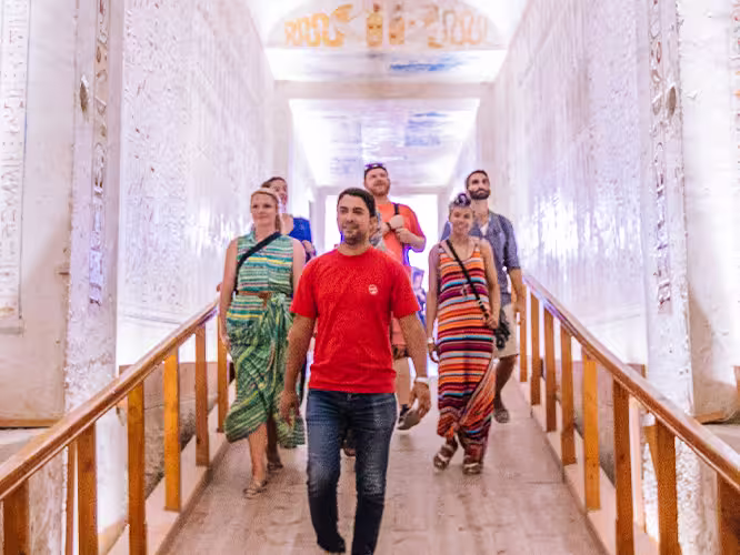 Travellers walking through the temples in Luxor, Egypt