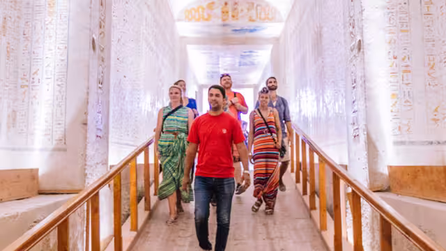 Travellers walking through the temples in Luxor, Egypt