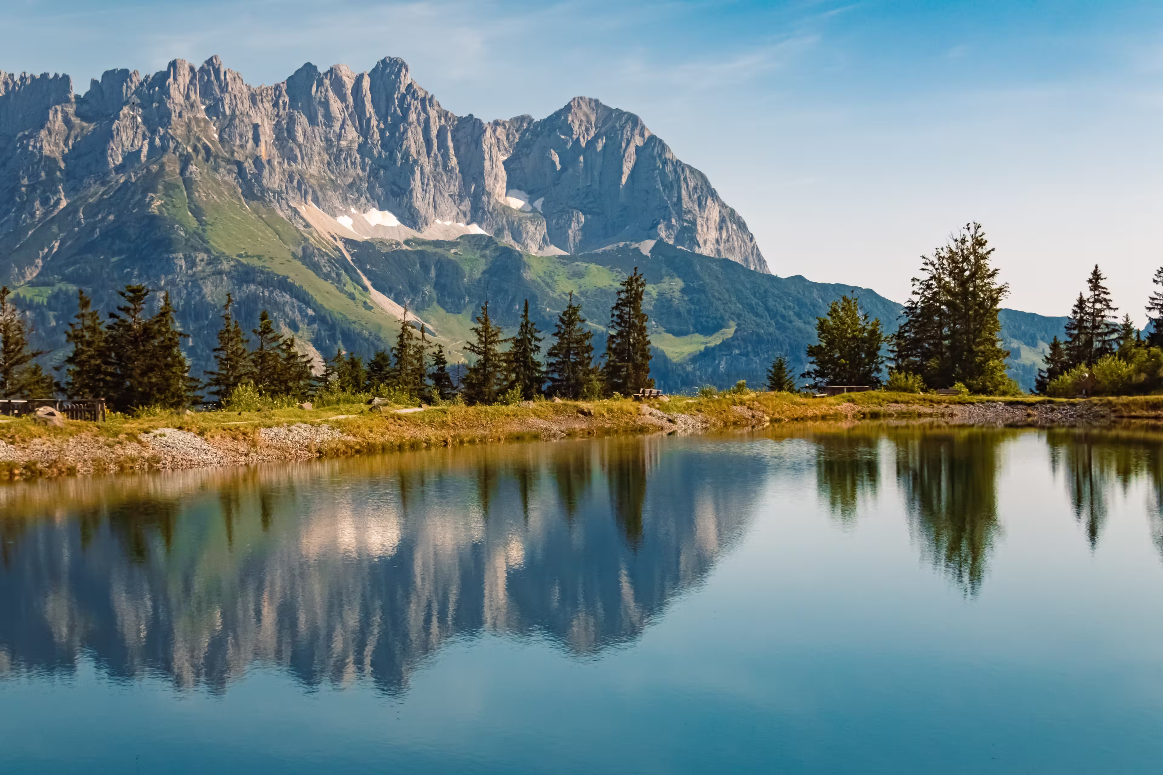 Alpine summer view with reflections and Mount Wilder Kaiser at Mount Astberg, Going, Kitzbuehel, Tyrol, Austria