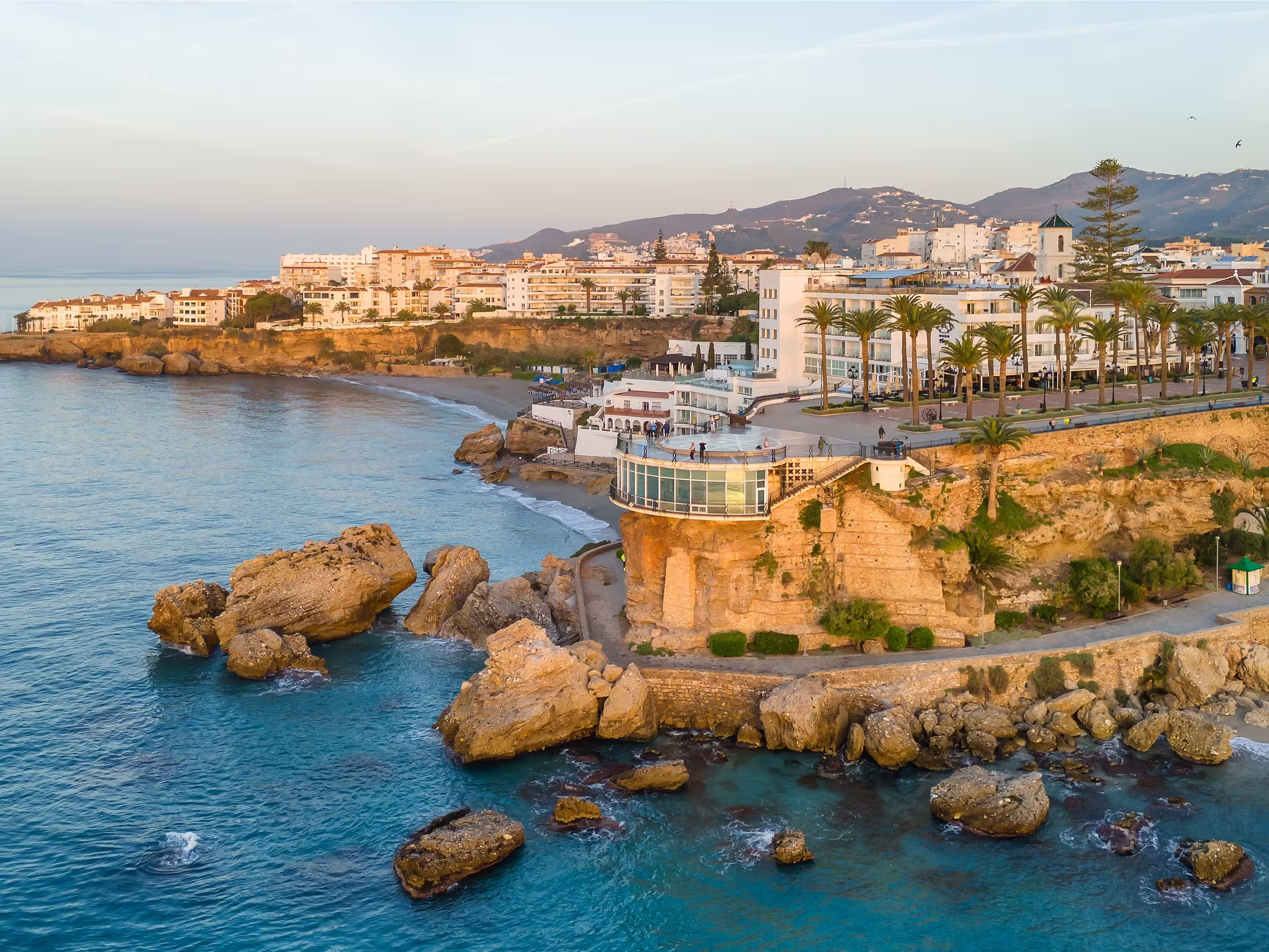 Aerial view of the famous mirador view point Balcon de Europa in Nerja resort town on Costa del Sol Mediterranean sea coast at sunrise in Andalusia, Spain