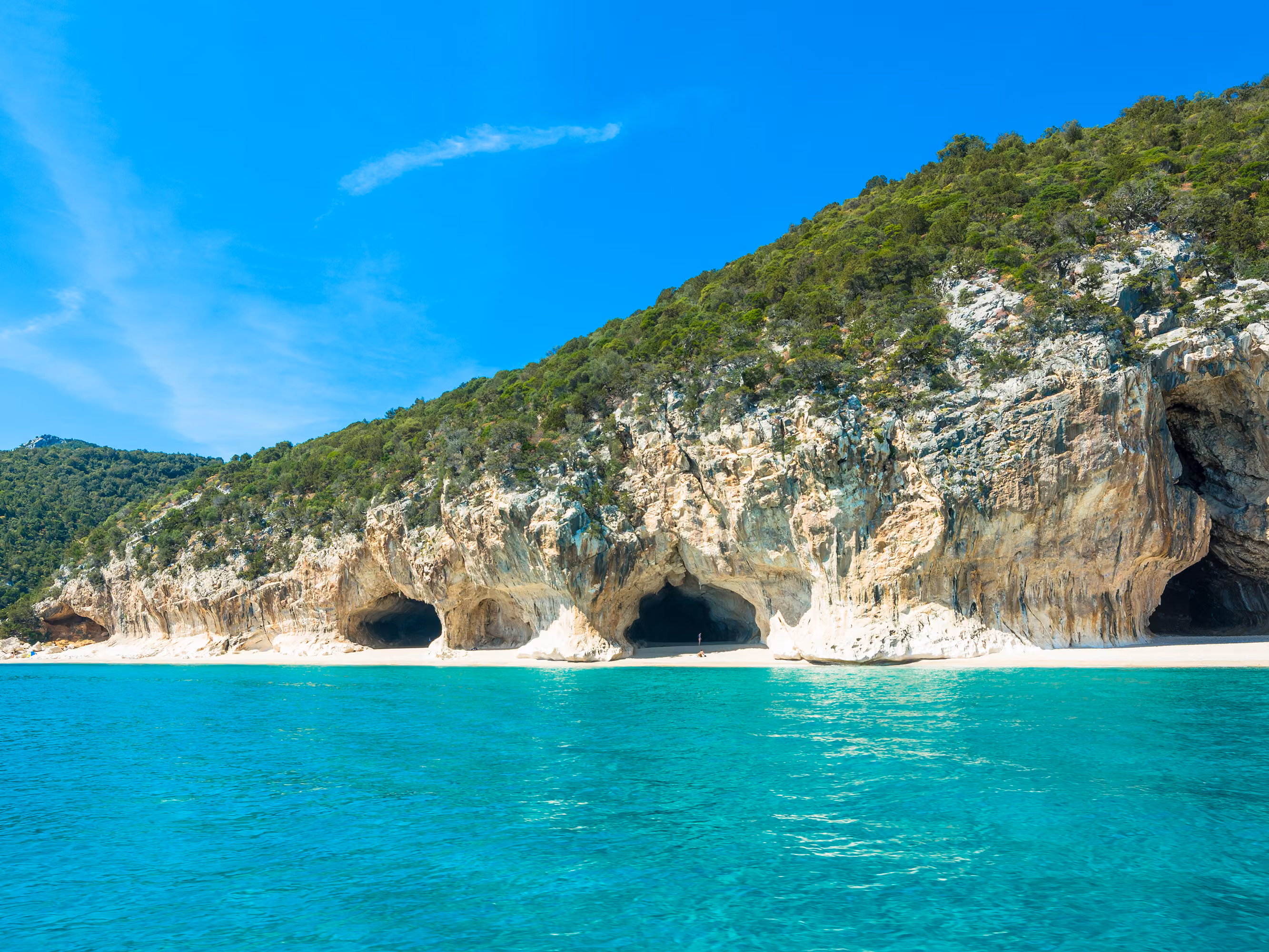 Cala Gonone shoreline on a clear day, Sardinia