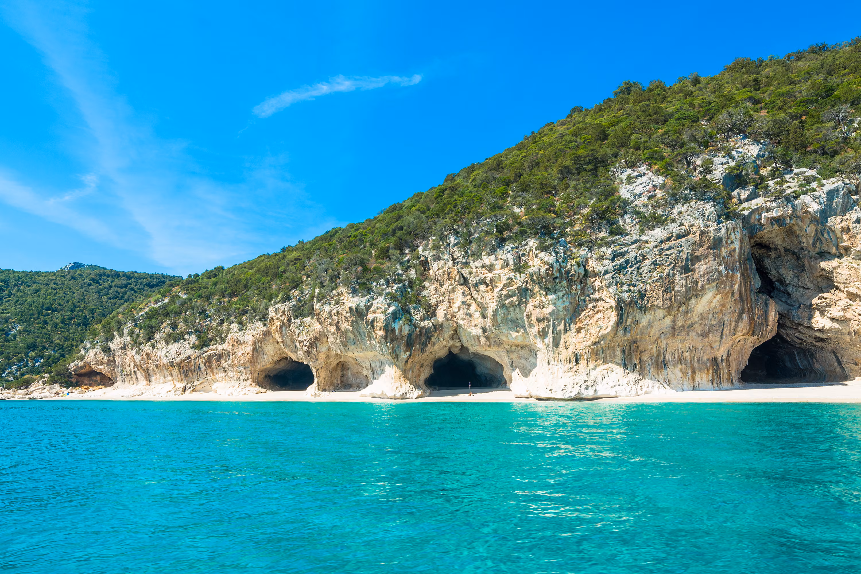Cala Gonone shoreline on a clear day, Sardinia
