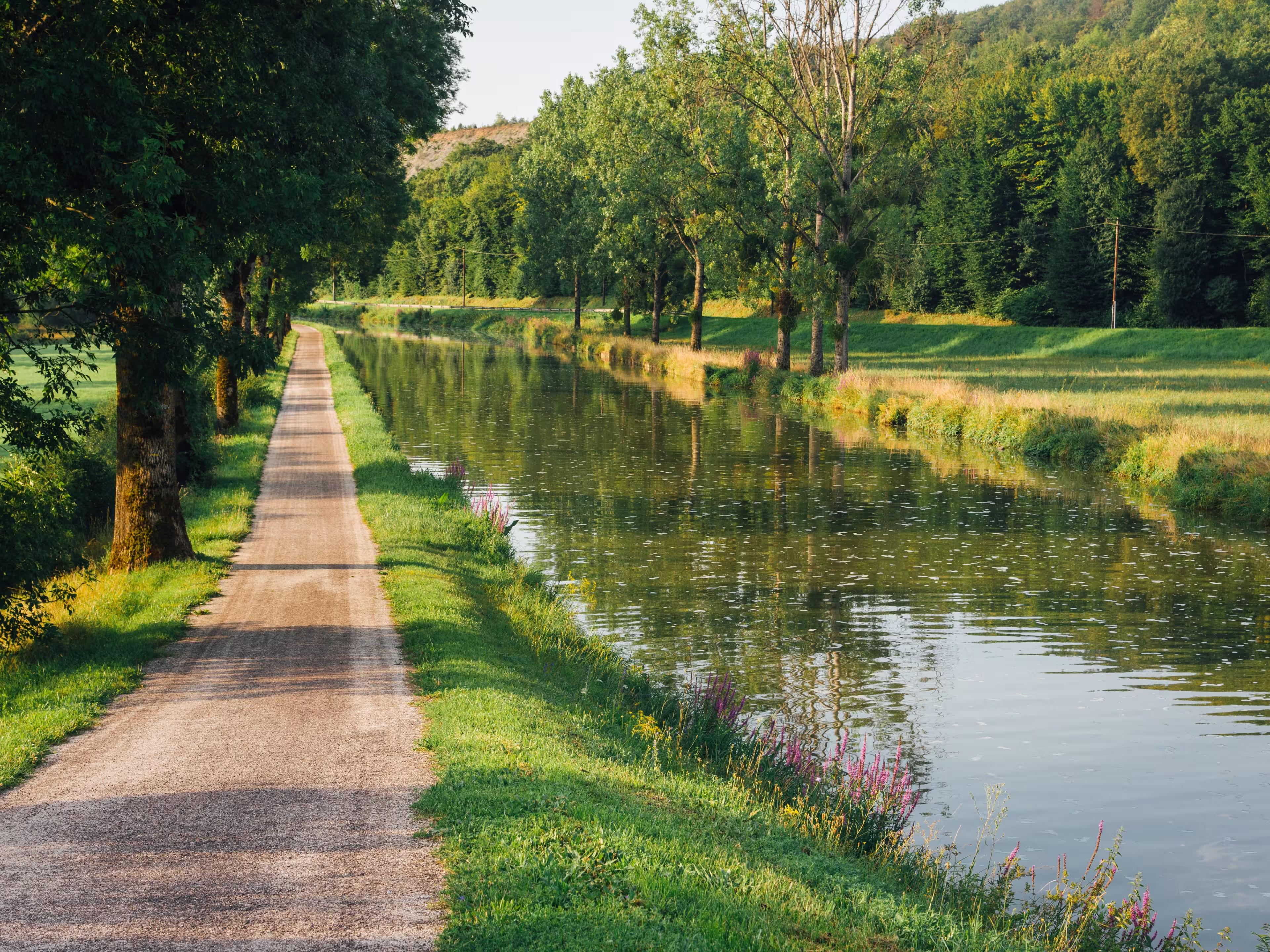 Towpath on the Burgundy canal. Hiking trail. Holiday route.