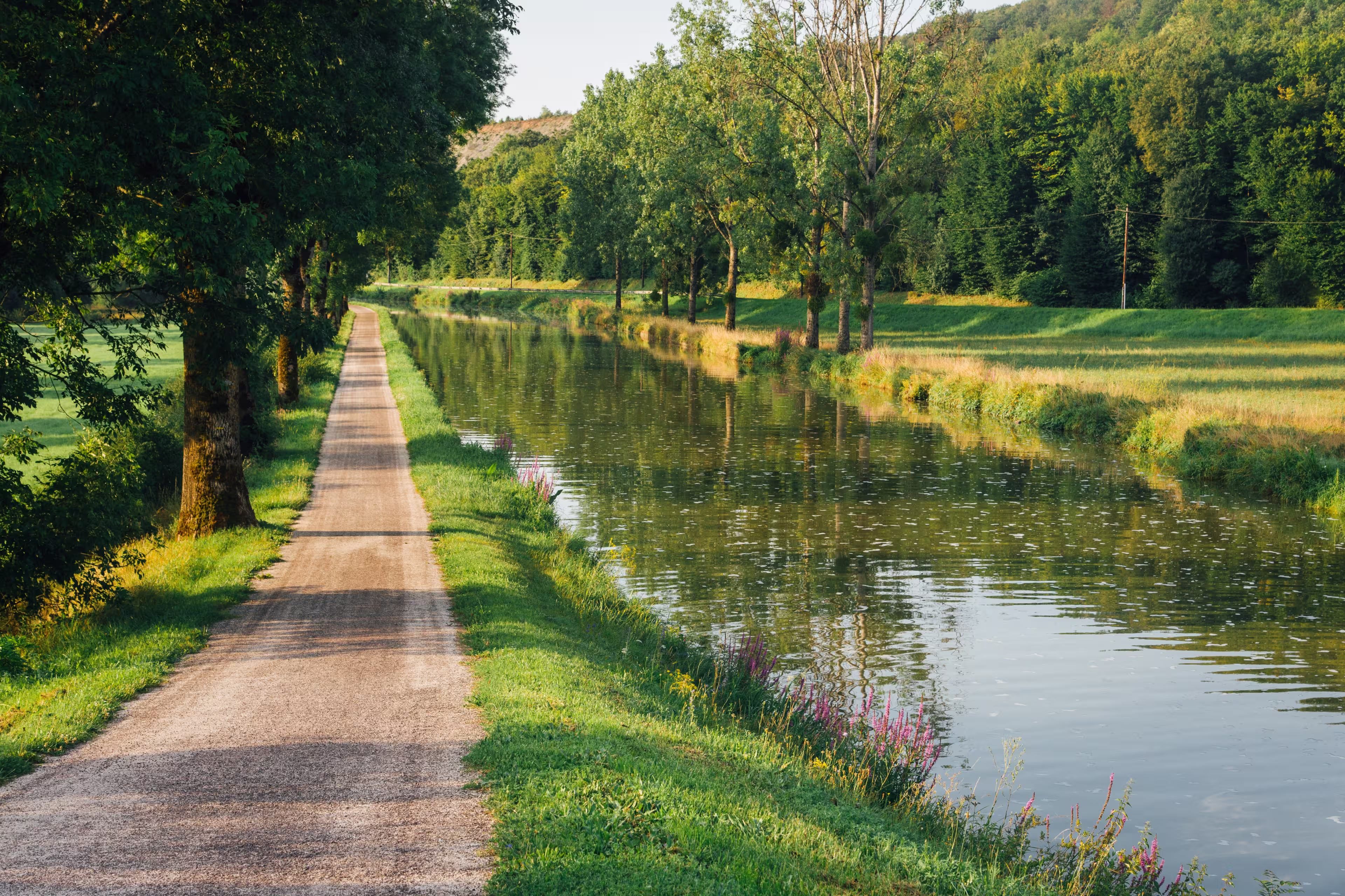 Towpath on the Burgundy canal. Hiking trail. Holiday route.